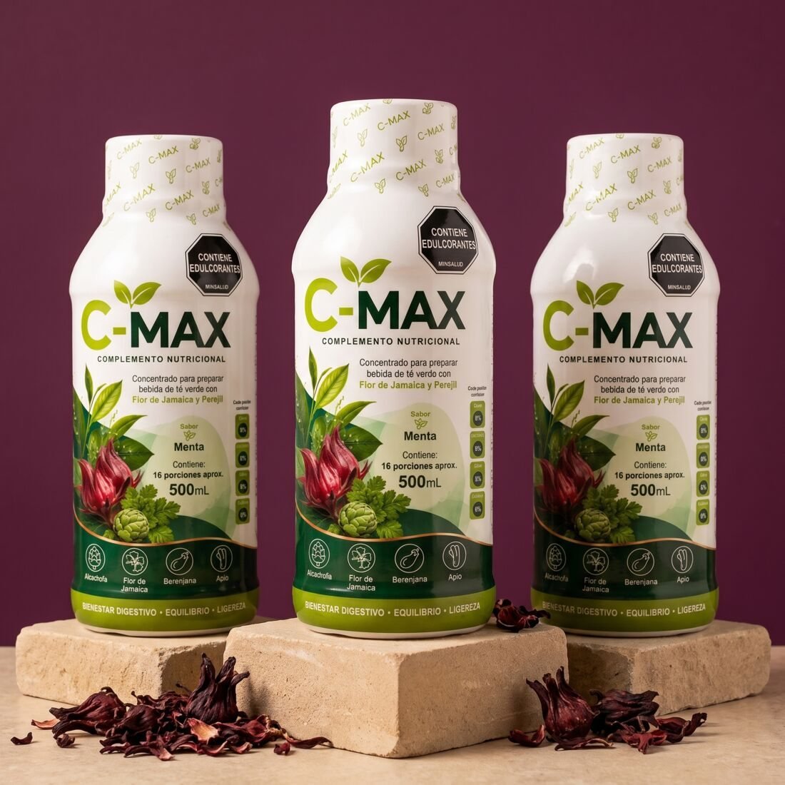 Tres frascos de C-MAX sobre pedestales